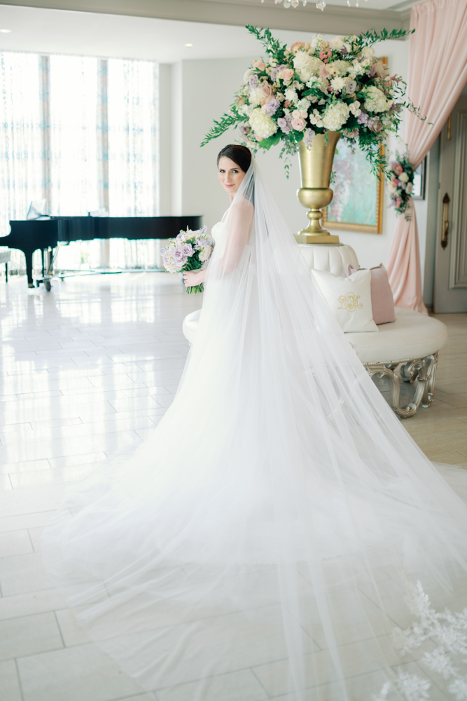 The bride poses with her veil at Grand Bohemian Hotel Mountain Brook.