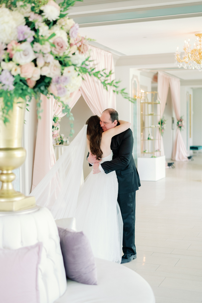 The bride and groom embrace after their first look at Grand Bohemian Hotel Mountain Brook.