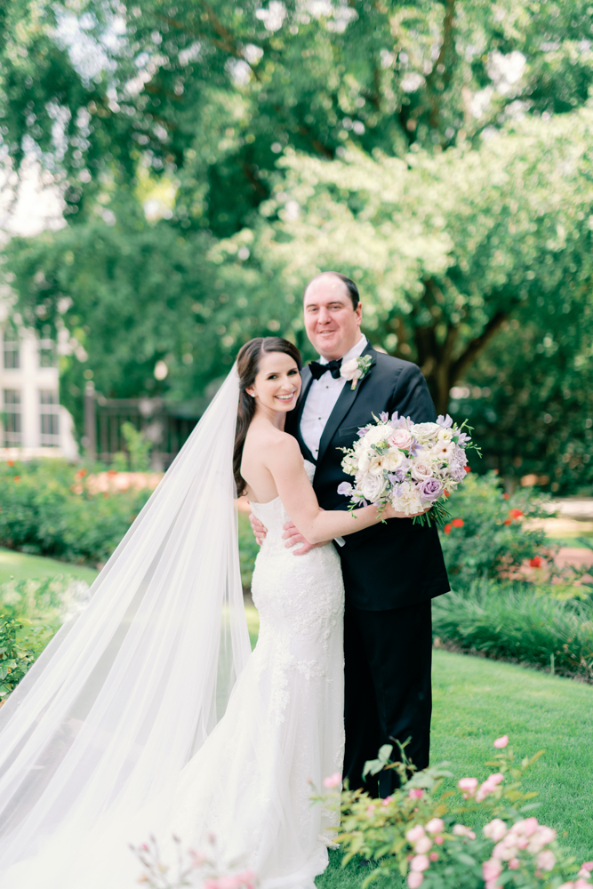 The bride and groom embrace at