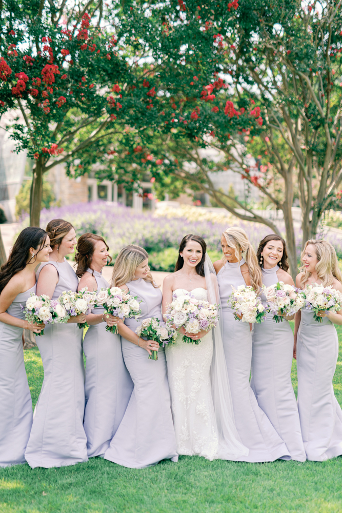 The bridesmaids wear lavender dresses with the bride for this spring wedding in Birmingham.