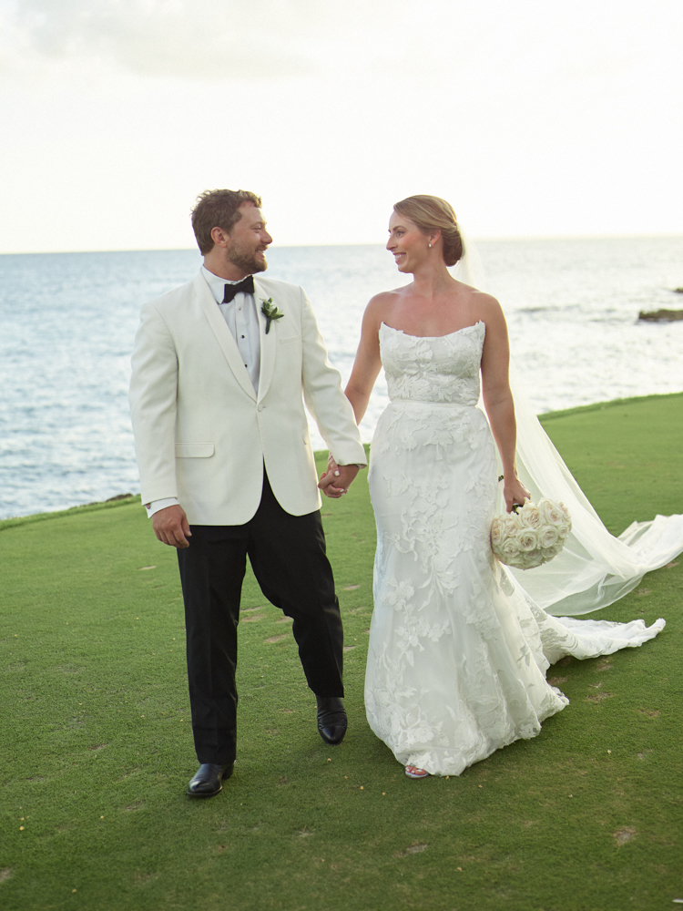 Handley Breaux McCrory walks with Michael Andrew Smith during their destination wedding.