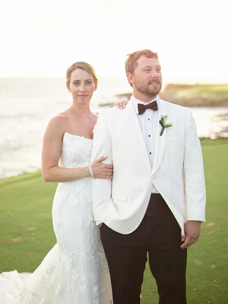 Handley Breaux McCrory & Michael Andrew Smith stand together during their destination wedding.