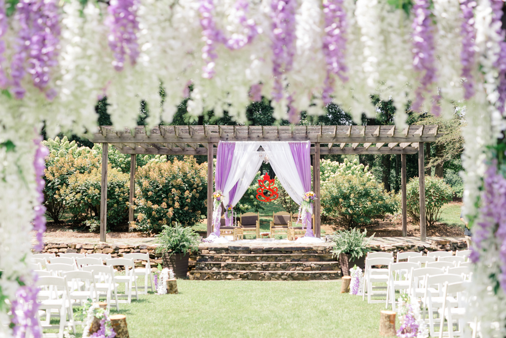 A traditional Indian mandap is set for the bride and groom at Mathews Manor in Springville, Alabama.