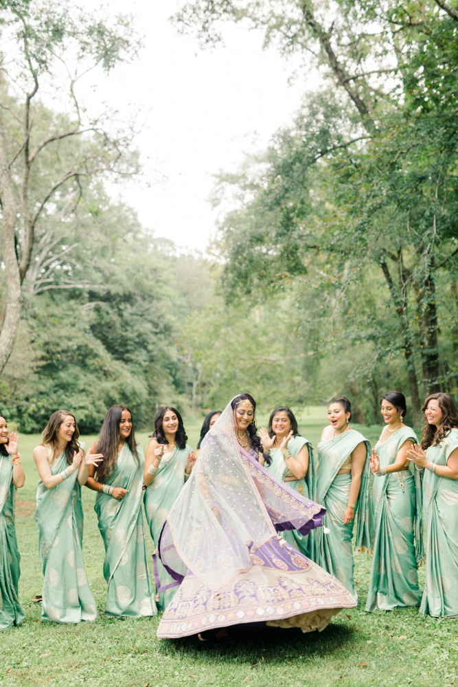 The bride and her bridesmaids wear traditional Indian attire for the wedding ceremony at Mathews Manor in Springville, Alabama.