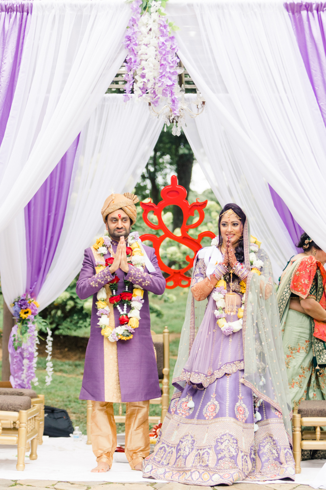 The bride and groom celebrate a traditional Indian wedding in Alabama at Mathews Manor.