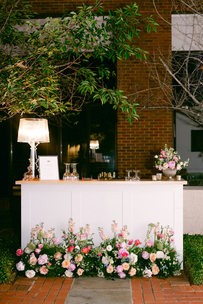 The bar is set for this outdoor wedding reception designed by CONFERO at Montgomery Museum of Fine Arts.