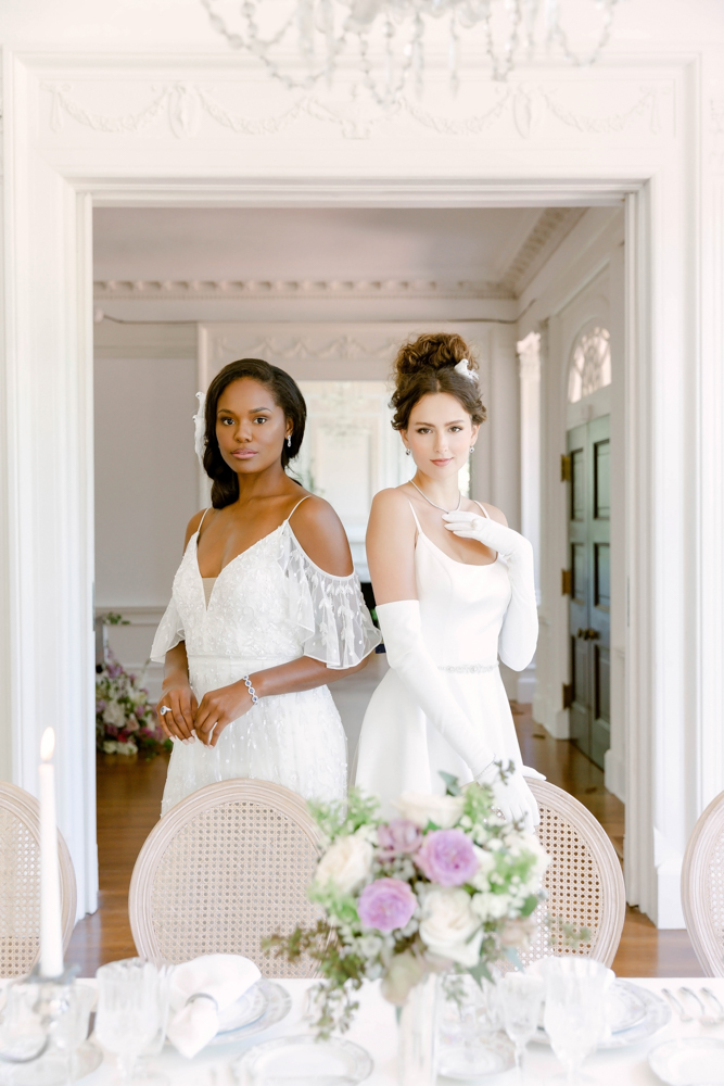 Two Southern brides wear their wedding dresses from Bella's Bridal & Formal at The 1616 House.