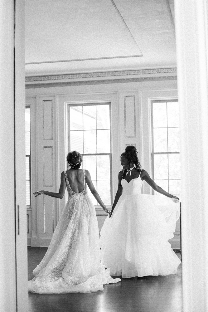 Two brides have fun for a fashion feature photographed by Mo Davis Photography at The 1616 House.