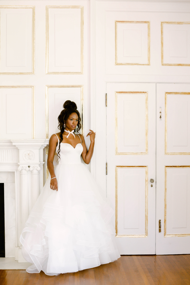 The bride wears her wedding dress from McClendon Bridals at The 1616 House in Montgomery.