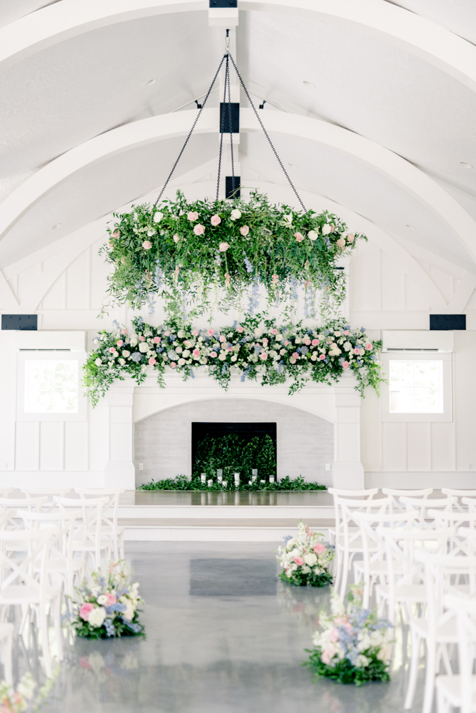 Oak Meadow Event Center is decorated with beautiful flowers for a Southern wedding.