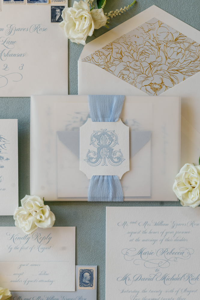 Layflat styling of these white and blue invitations by Paperhaus is captured by Piper Vine Photography.