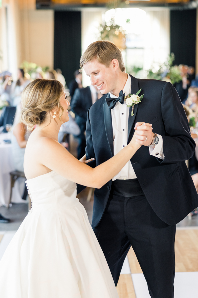 The bride and groom share a first dance during their Southern wedding reception at The Farrell.