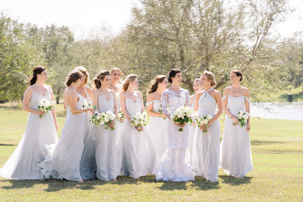 The bridal party escorts the bride to the wedding ceremony in Fairhope.