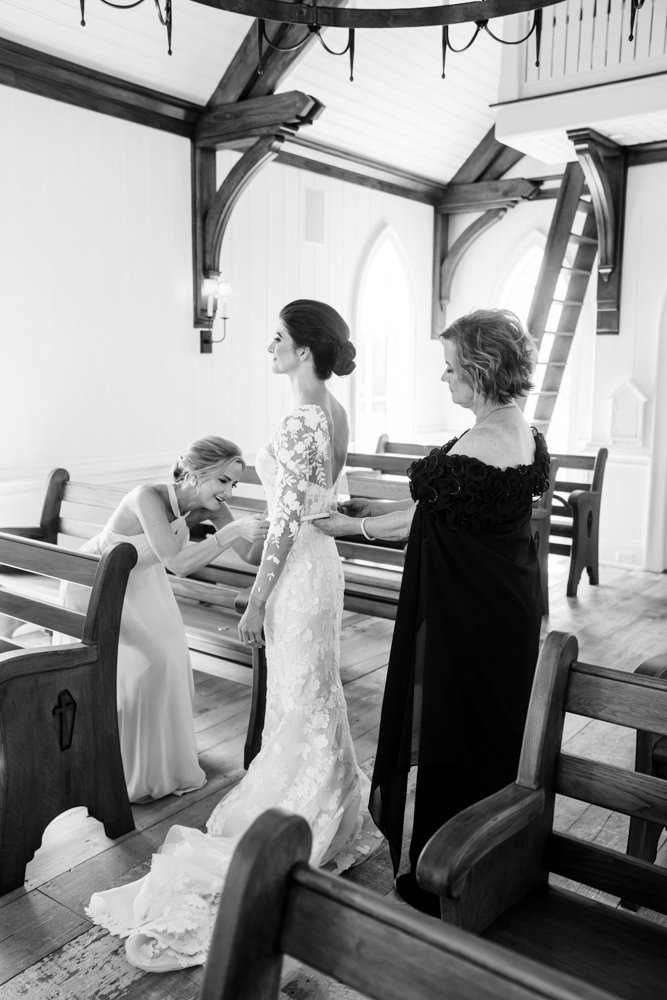 The bride gets the finishing touches as she prepares for her Southern wedding ceremony.