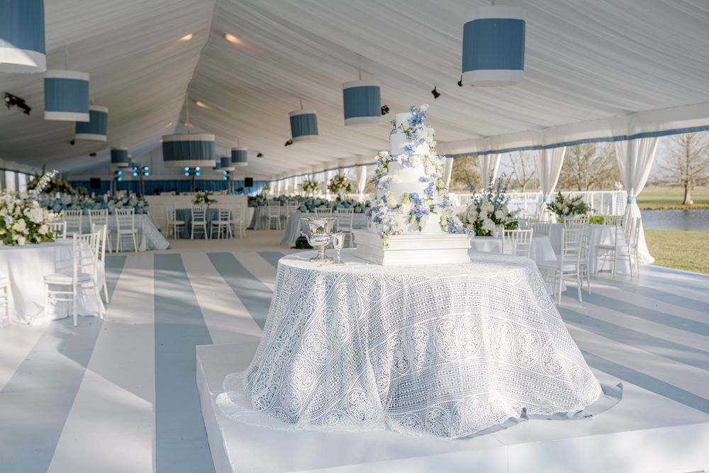 This blue and white tent reception in Fairhope Alabama is a beautiful setting for a Southern wedding.