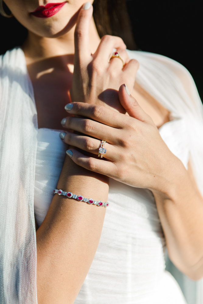 A Southern bride wears ruby and diamond jewelry from Bromberg's on her wedding day.