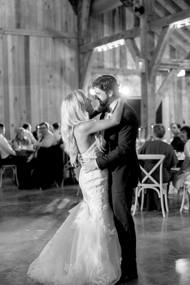 The bride and groom share a first dance at Burns Bluff at High Falls.