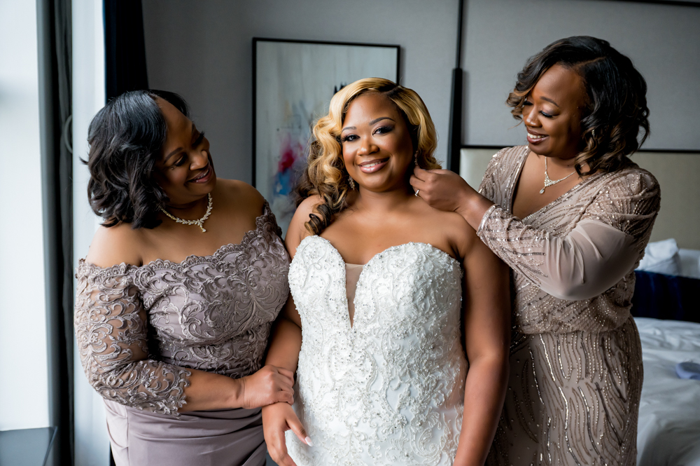 The bride's family prepares her for her Birmingham wedding in Alabama.