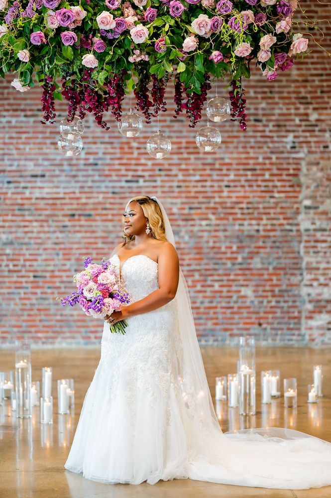 The bride poses with her bouquet for her Birmingham wedding in Alabama.