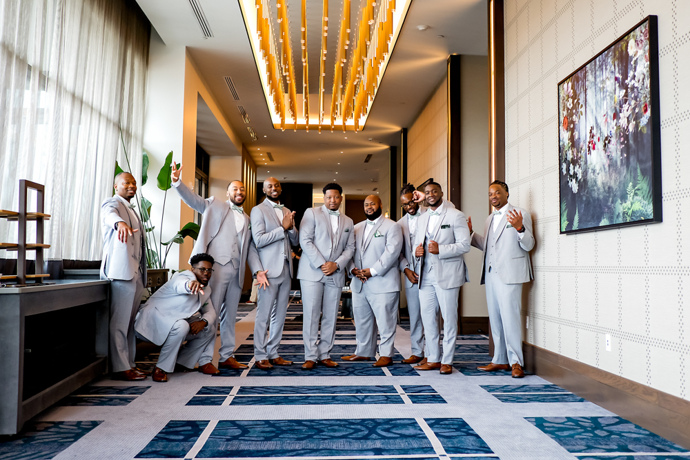 The groomsmen pose together at The Valley Hotel in Homewood.