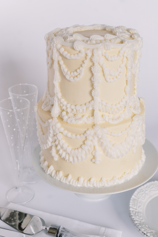 Olexa's Cafe prepares a delicately piped wedding cake.