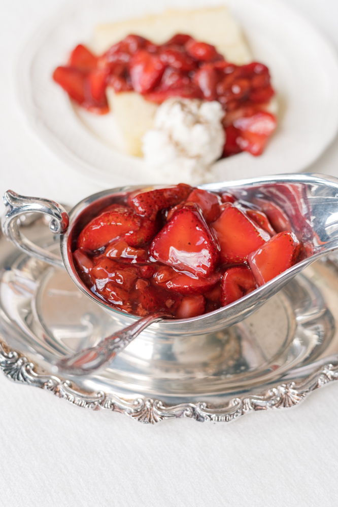 Strawberry compote is prepared for cake slices by Olexa's Cafe in Mountain Brook.