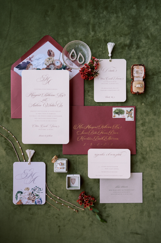 Alabama wedding invitations are styled in a lay flat by Paperhaus along with jewelry from Diamonds Direct.