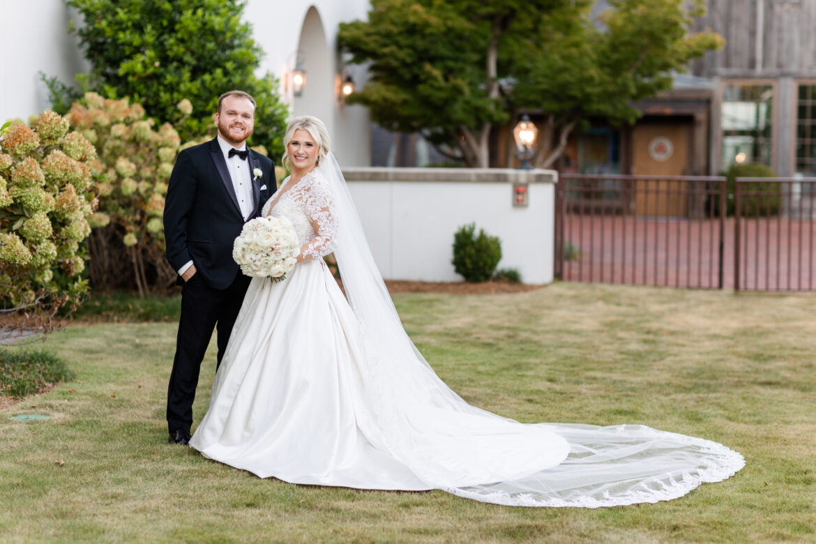 The bride and groom stand together at Grand Bohemian Hotel Mountain Brook.