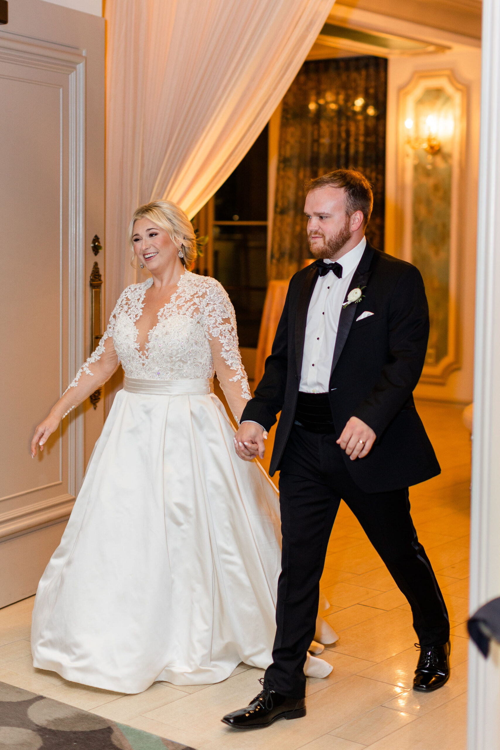 The bride and groom enter the Souther reception at Grand Bohemian Hotel Mountain Brook.