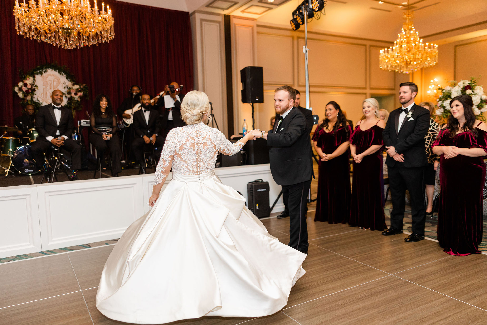 The bride and groom dance together in the ballroom at Grand Bohemian Hotel Mountain Brook.