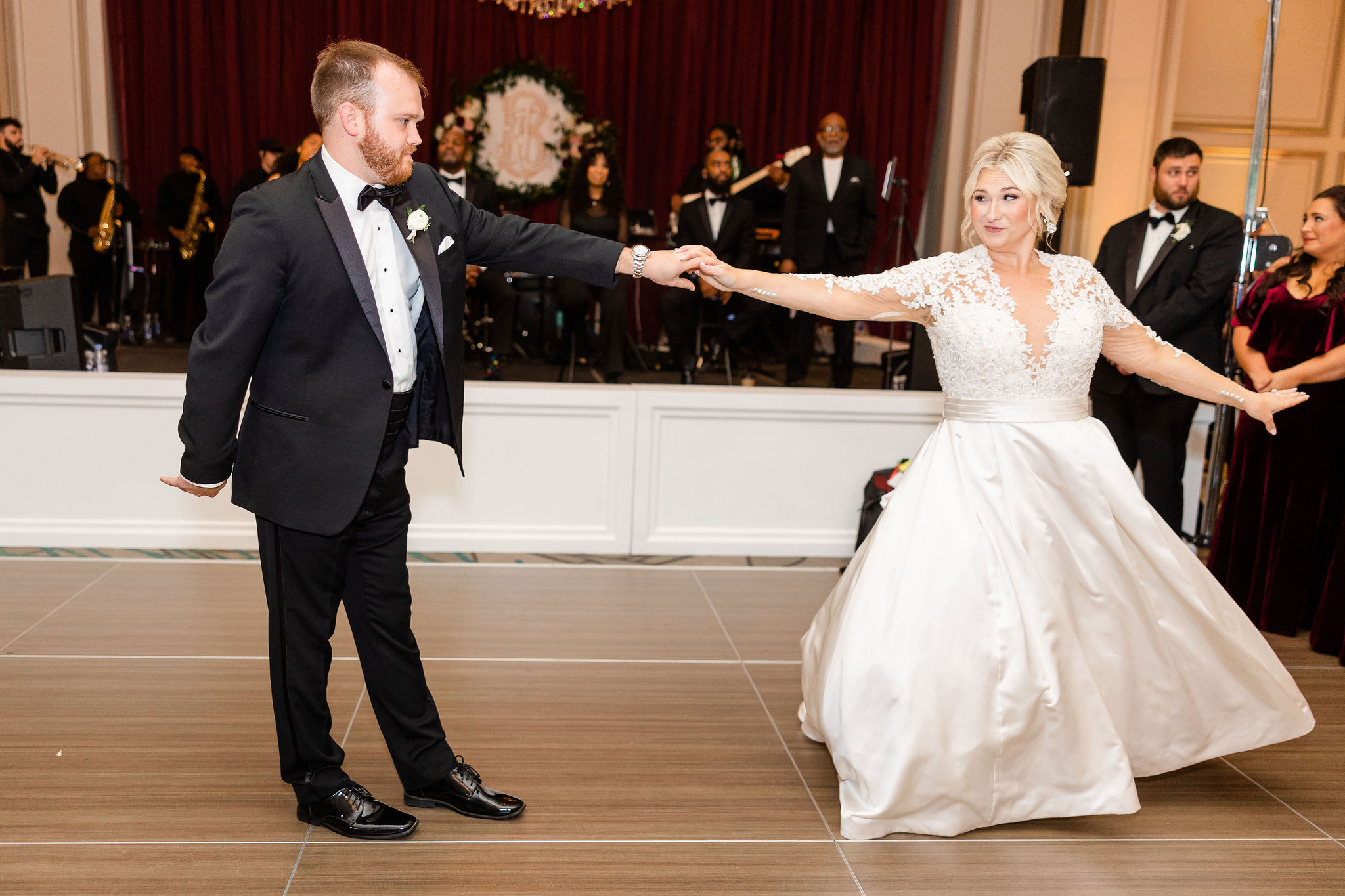 The bride and groom share a first dance in the ballroom Grand Bohemian Hotel Mountain Brook.