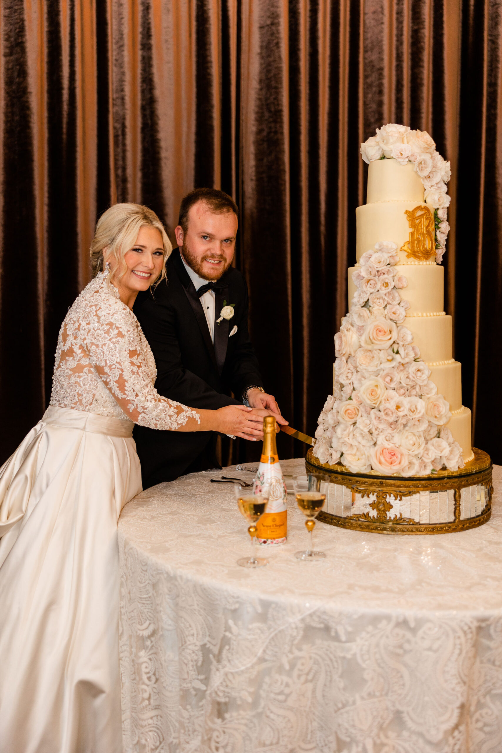 The bride and groom cut the cake at Grand Bohemian Hotel Mountain Brook.