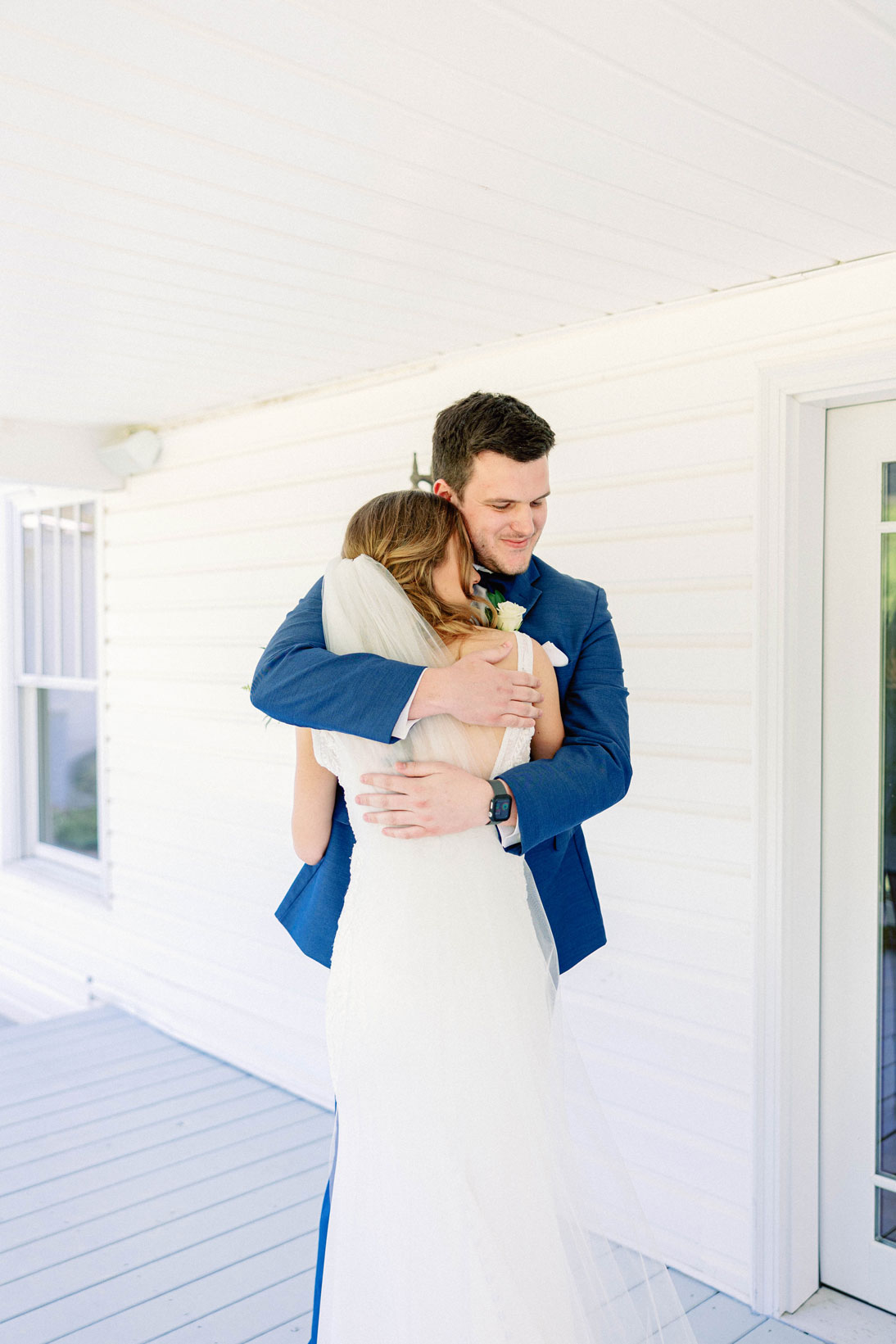 The bride and groom embrace at The Sonnet House.