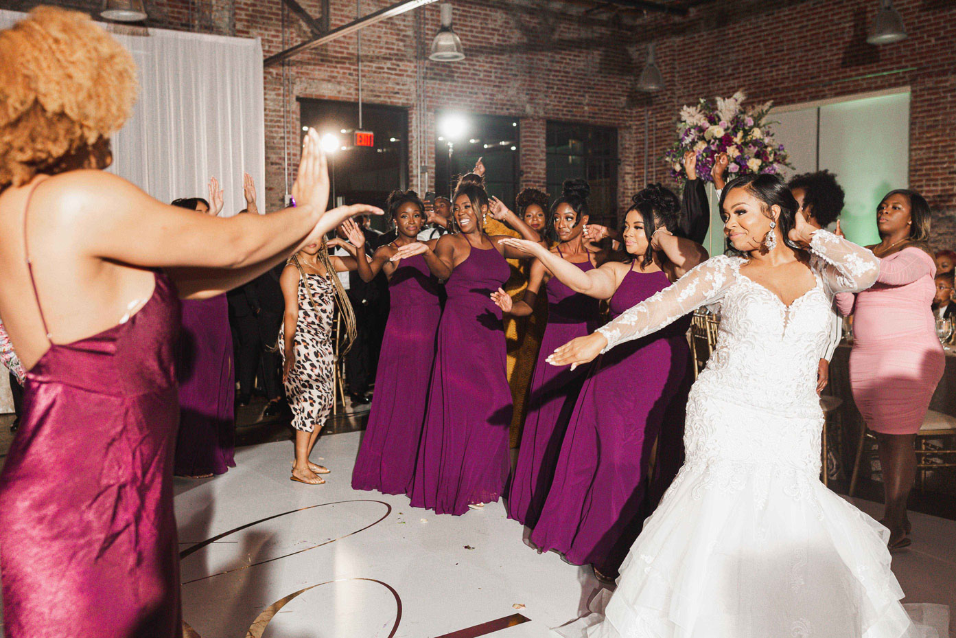 The bridesmaids dance with the bride during the reception at Haven in downtown Birmingham.