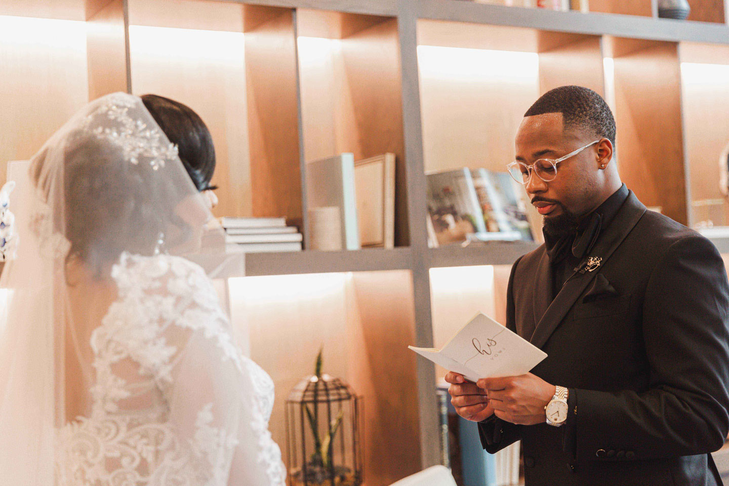 The groom reads his vows to the bride privately at The Valley Hotel in Alabama.