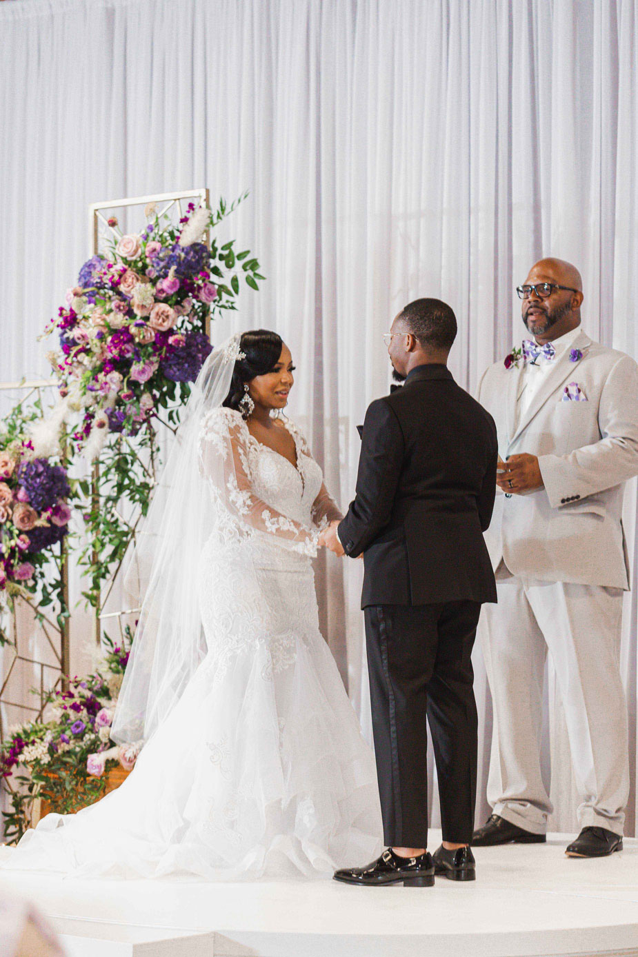 The bride and groom share their vows during the wedding ceremony at Haven in downtown Birmingham.