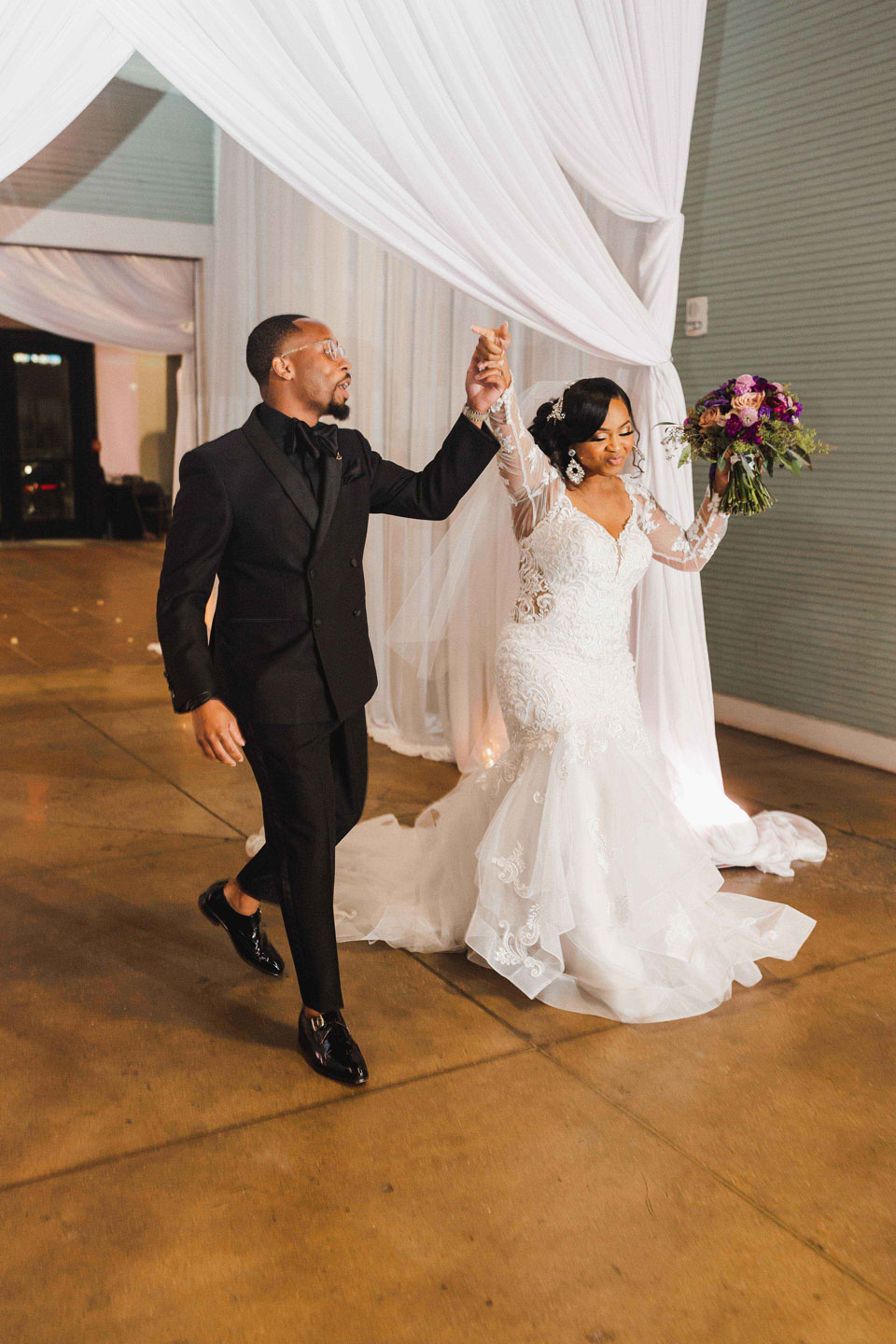 The bride and groom arrive to the reception at Haven in downtown Birmingham.