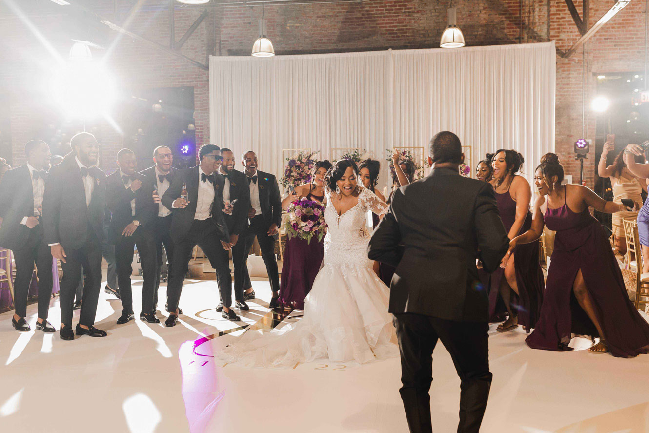 The wedding party dances together at the wedding reception at Haven in downtown Birmingham.