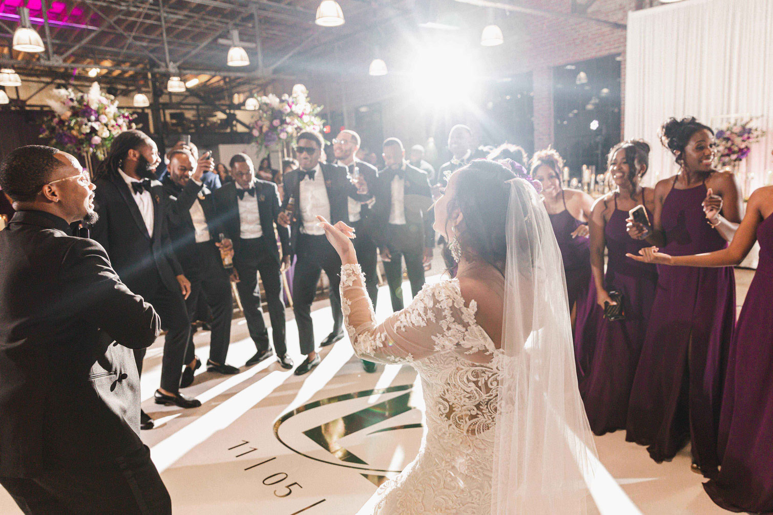 The wedding party dances with the bride during the Birmingham wedding reception at Haven.