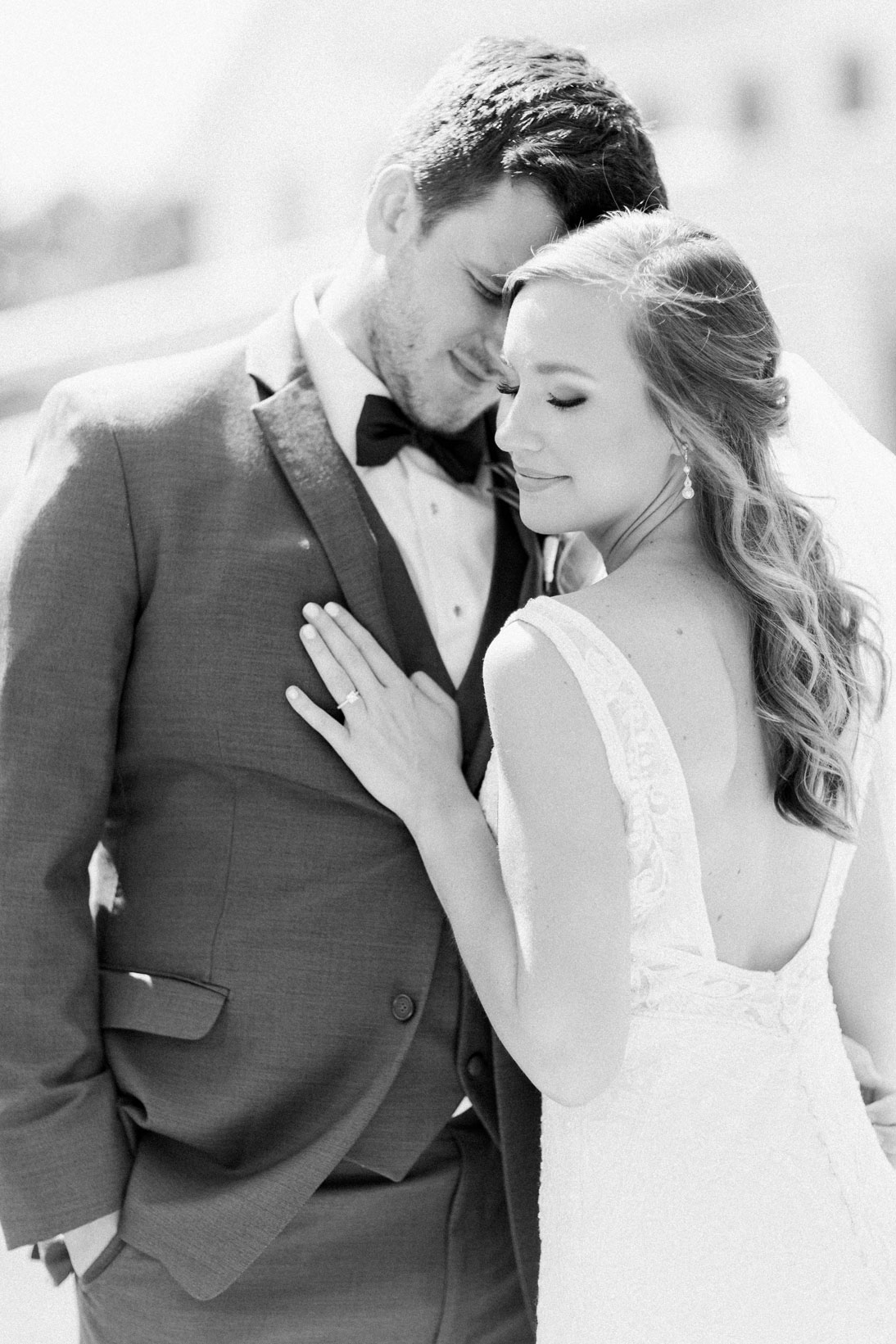 The bride and groom embrace before their Southern wedding.