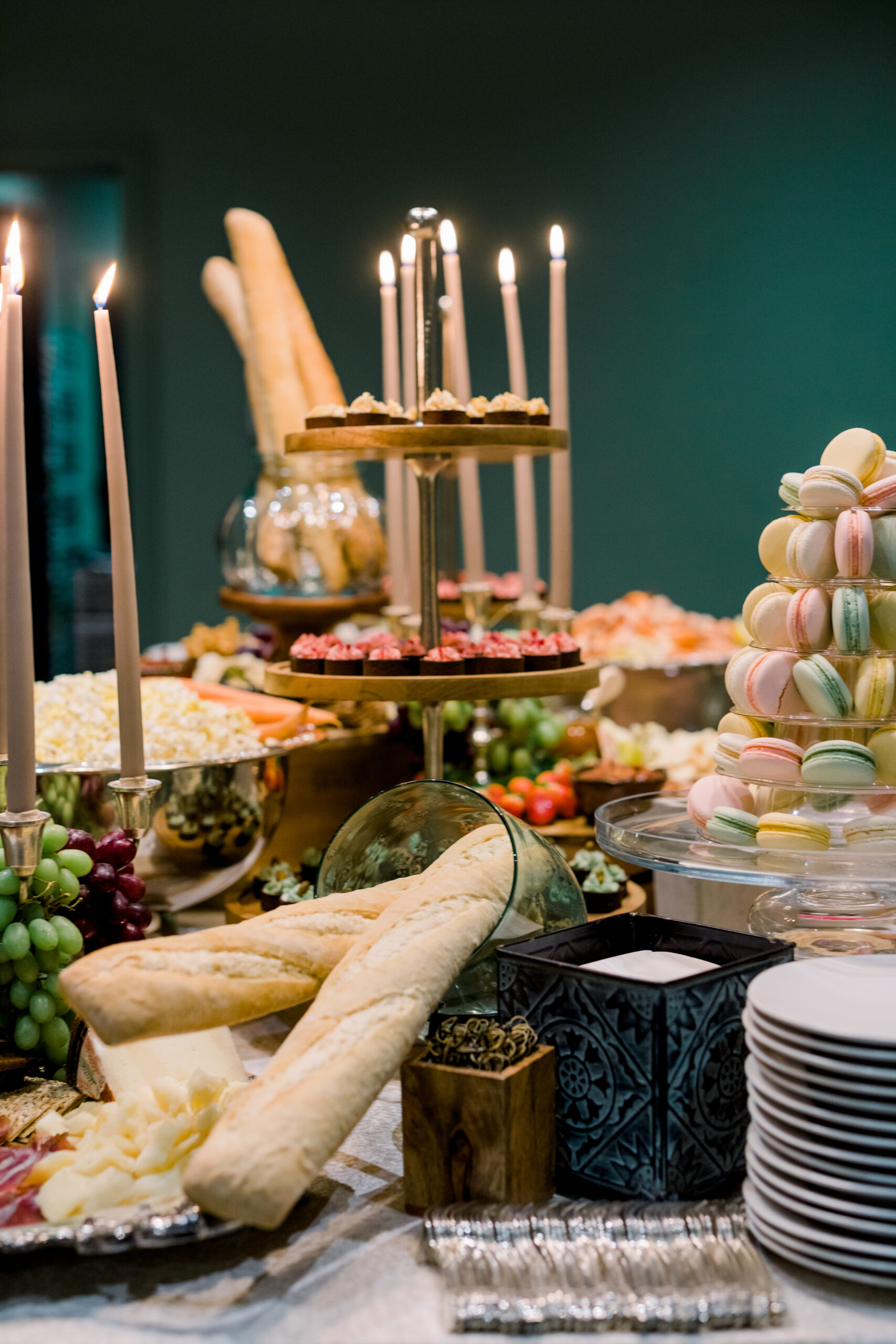 Tarts, macarons, and snacks are prepared for the Alabama Weddings party.