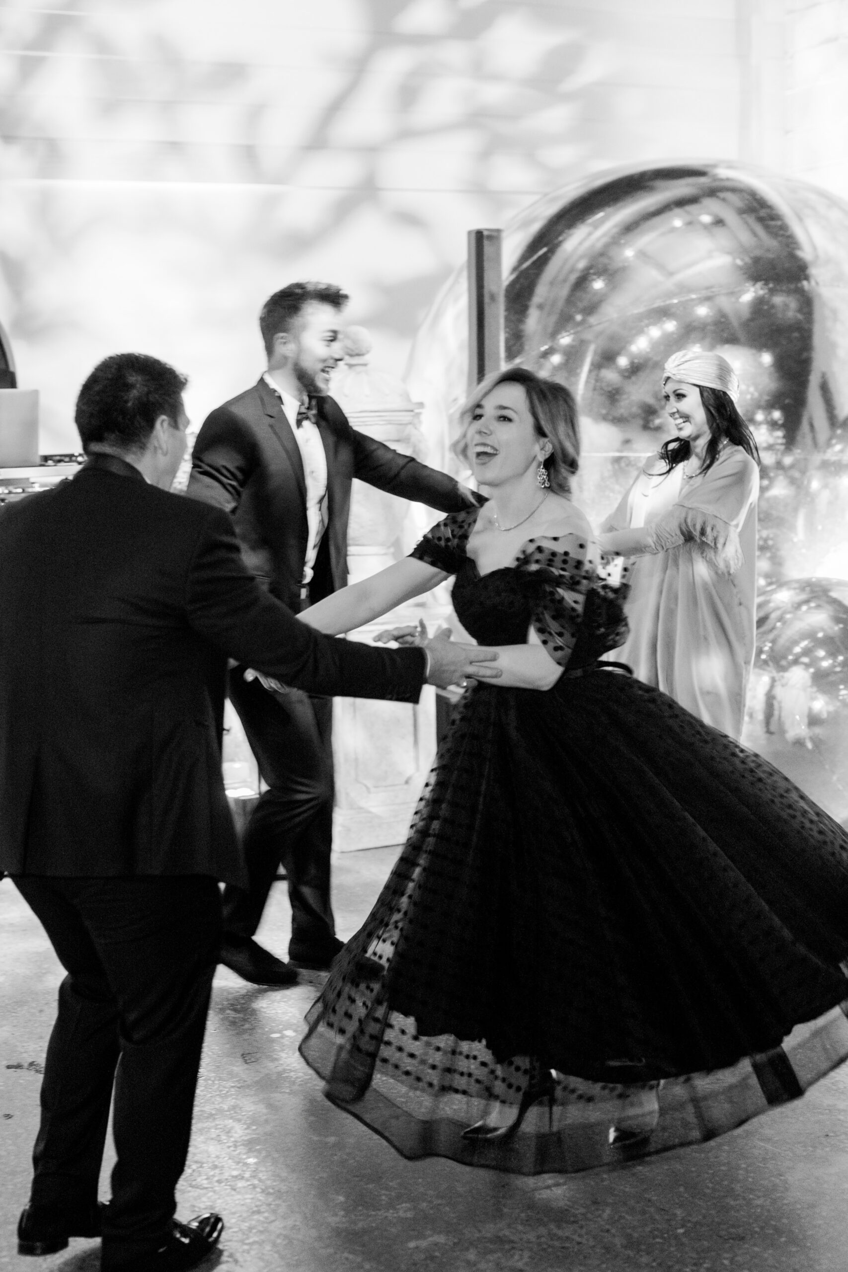 Guests dance together at the Alabama Weddings party in Birmingham.