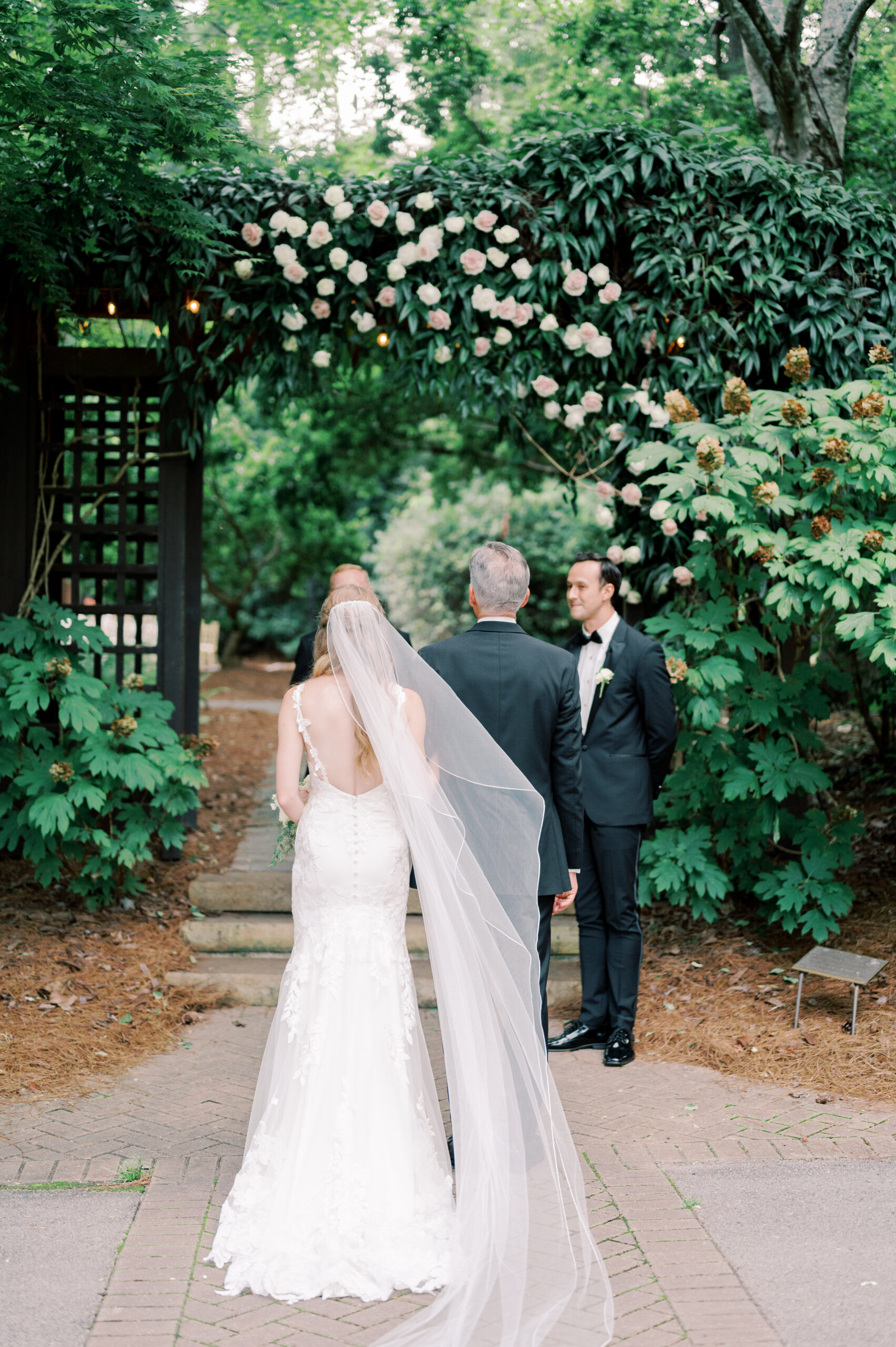 The father of the bride gives away his daughter during this Birmingham wedding ceremony.