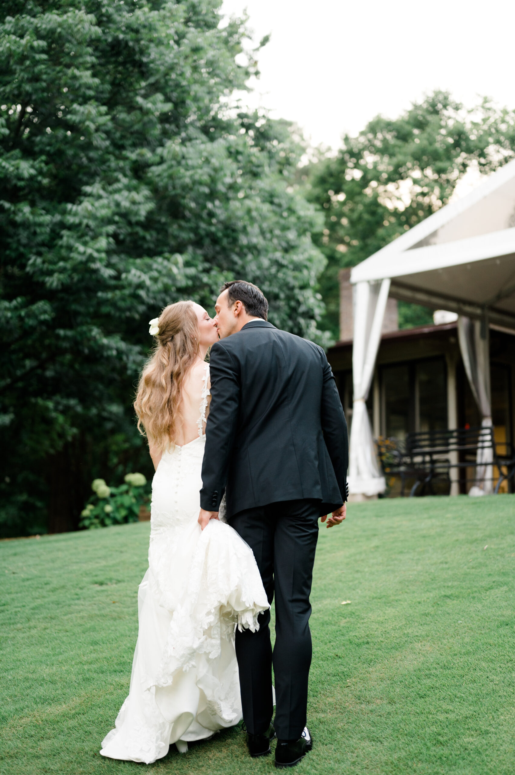 The bride and groom kiss after their Southern wedding ceremony.