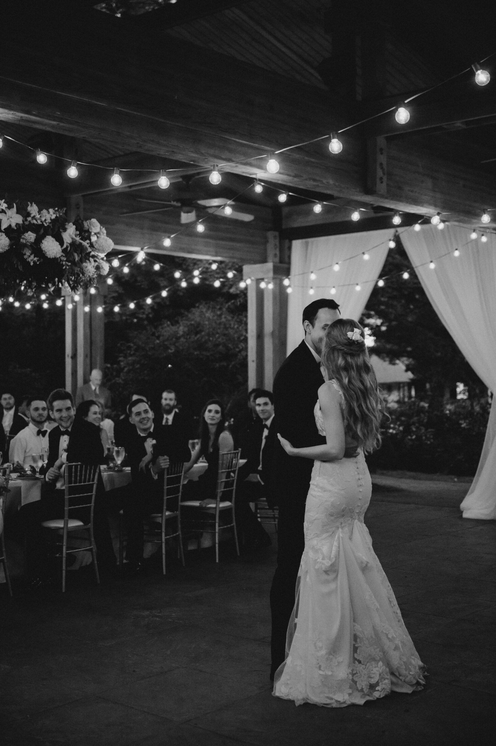 The couple has a first dance together at the Birmingham wedding reception.