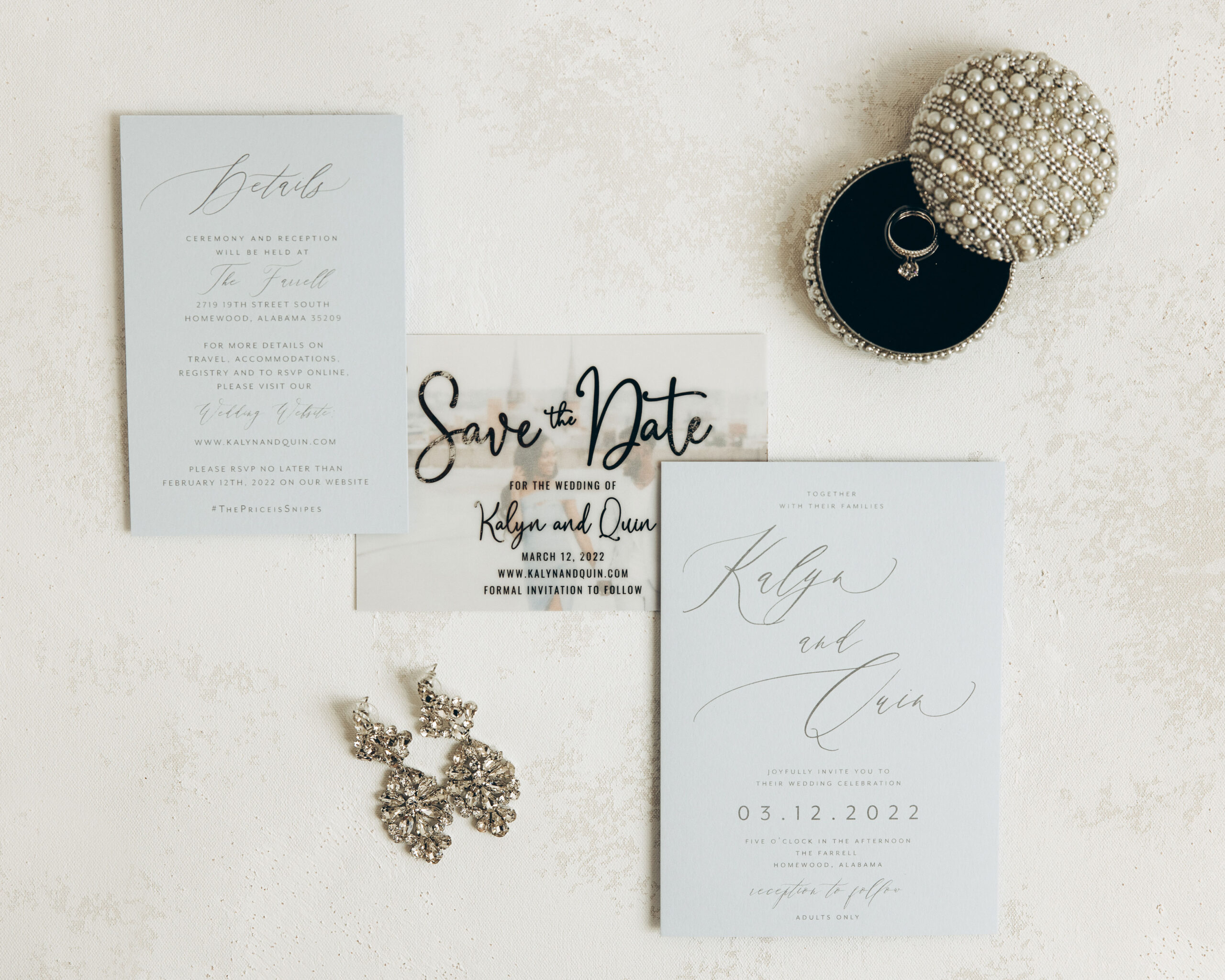 The wedding invitations are styled with the rings for the Birmingham wedding.