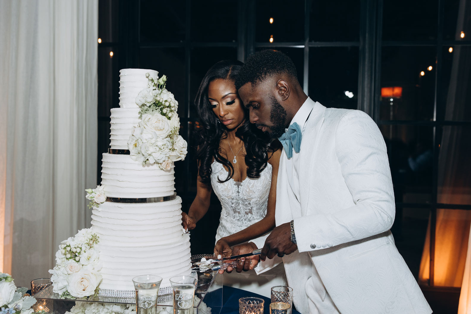 The bride and groom cut the cake at The Farrell during their Birmingham wedding.