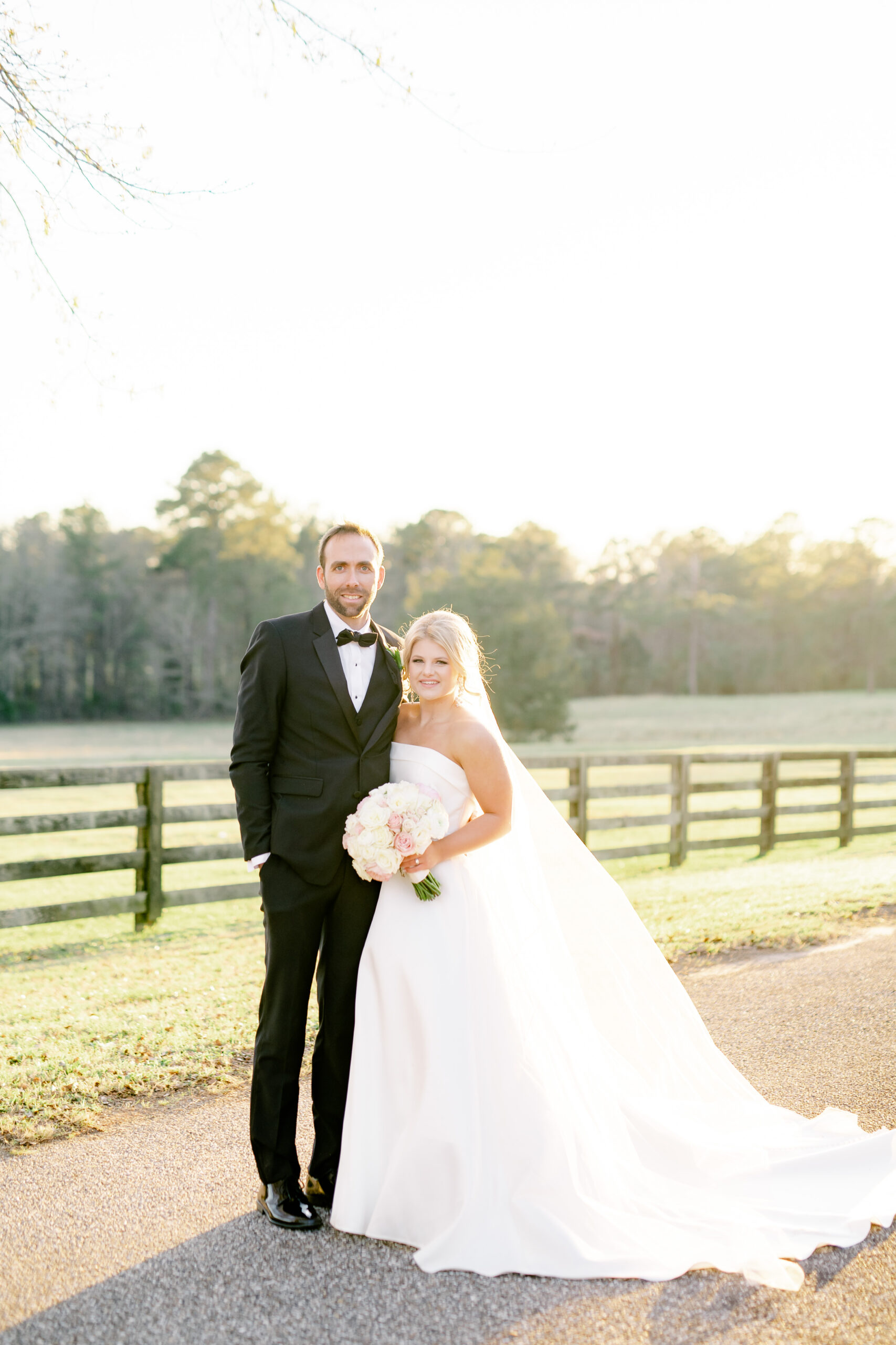 The couple stands together at Marsgate.