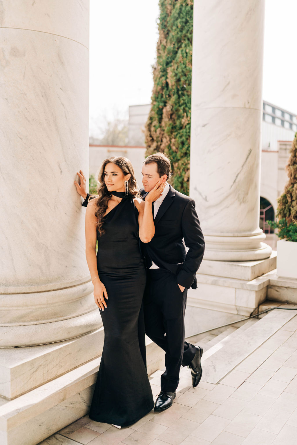 The woman touches her fiancé's cheek in downtown Birmingham, Alabama.