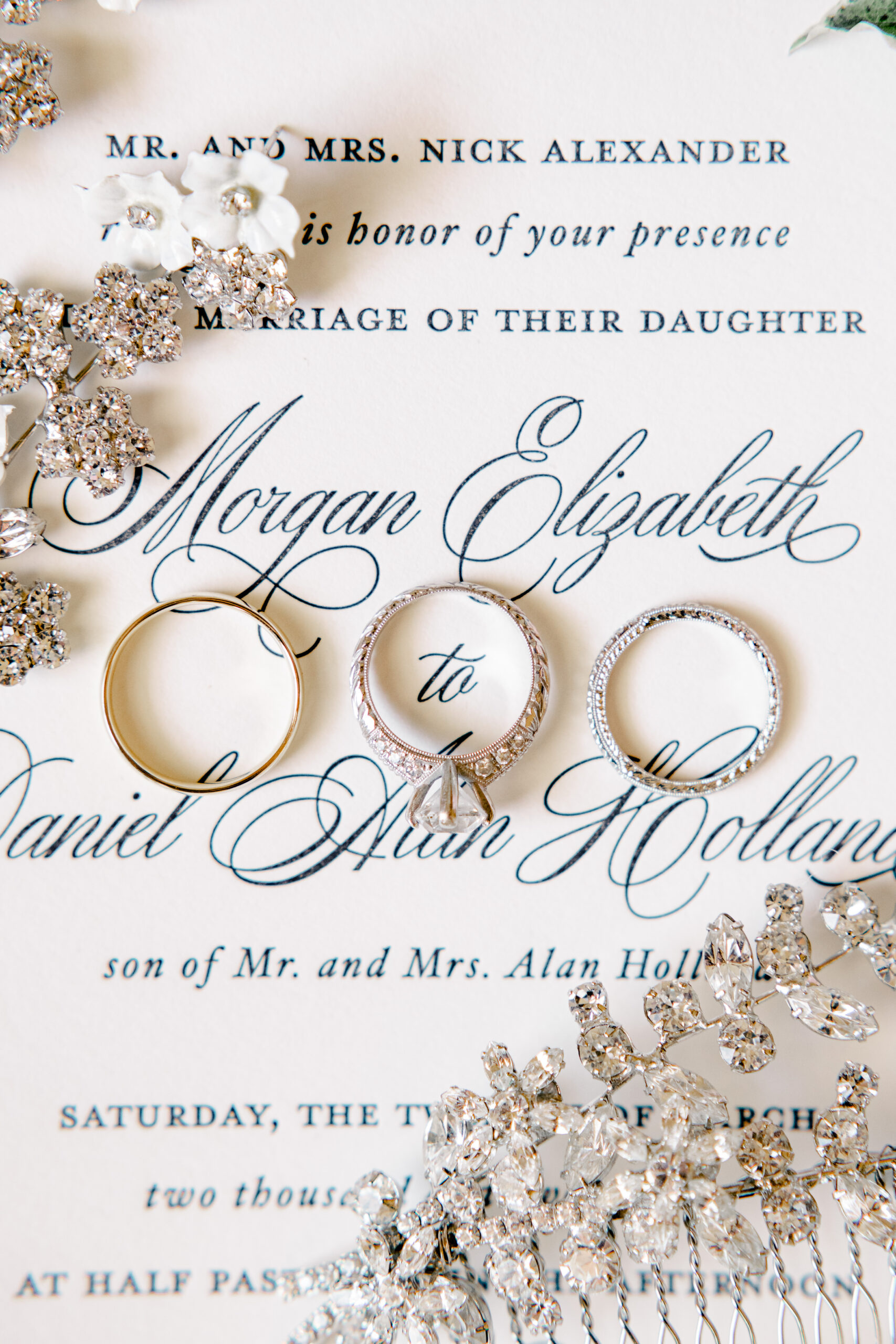 The Southern wedding invitations are styled with the rings.